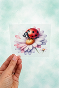 Bügelbild Marienkäfer mit Blume
